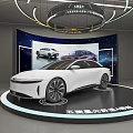 Car Dealership Showroom Showcasing White Car With Modern Lighting And Display Screen