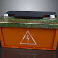 Car Battery With Orange Green Casing Black Top Cover Silver Terminals And Lightning Symbol