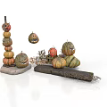 Tower Of Stacked Carved Halloween Pumpkins With Smiley Faces And Hay Decorations
