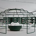 Elegant Green Cosmetic Store Interior With Circular Counter And Product Shelves