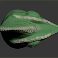 Detailed Green Chameleon Head Sculpture With Textured Skin And Horned Crest