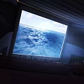 Cinema Experience With Large Screen Showing Ocean Waves And Seated Audience 3d model