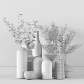 Modern White and Transparent Vases with Green Plants and Golden Decor