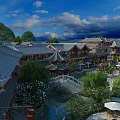 Traditional Chinese Commercial Street With Red Lanterns Small Bridge Lotus Pond And Willow Trees