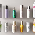 Perfume and Cosmetics Display With Various Colored Bottles Metallic Caps And Serum Lotion Containers