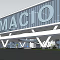 Modern Industrial Factory Building With Glass Curtain Wall Surrounding Greenery And MAGIC Branding