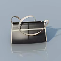 Stylish Black Handbag With White Accents And Strap On Light Blue Background