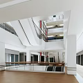 Spacious Modern Shopping Mall Lobby With Multi Level Staircase And Glass Railings