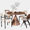 Round Wooden Dining Table With Four Chairs White Cushioned Seats And Decorative Vase With Dried Branches
