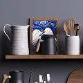 Stylish Kitchenware Arranged On Wooden Shelves With Pitcher Mugs Spoons Jars And Glasses