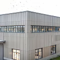 Modern Industrial Factory Building With Metal Panel Facade And Large Windows