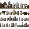 Ceramic Vessels Collection Displayed On Shelves With Various Shapes And Textures