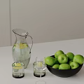 Decorative Ornament Set With Clear Glass Pitcher Lemon Water Glasses Green Apples And Black Bowl