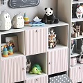 Cute Children's Room Storage Shelving Unit With Pink Cabinets Stuffed Toys And Storage Boxes