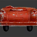 Old Red Vintage Toy Car With Peeling Paint On Its Surface
