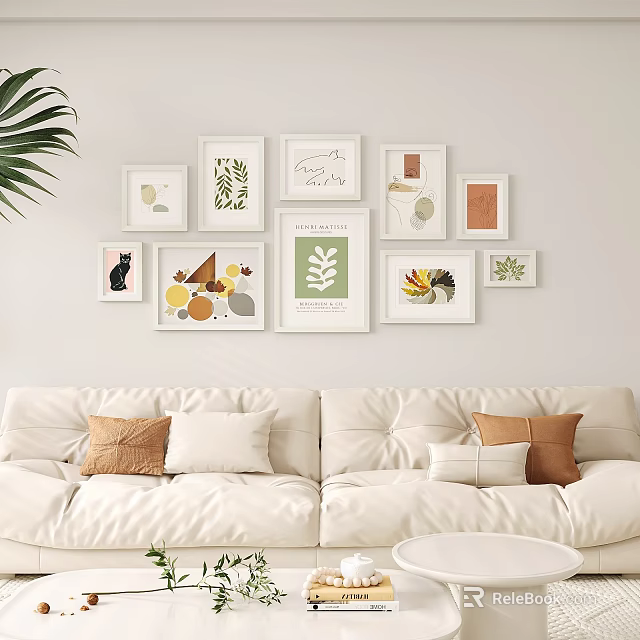 Modern Photo Wall Decor With Various Frames Art Prints And White Sofa Pillows 3d model 