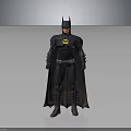 Batman Action Figure In Black Costume With Yellow Chest Symbol And Cape