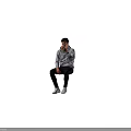 A Man Sitting And Drinking In Gray Hoodie Black Pants White Sneakers With Brown Cup