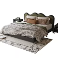Cozy Modern Double Bed with Curved Headboard Patterned Quilt Pillows Nightstands and Decorative Rug