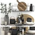Modern Kitchenware Display With Teapot Oil Bottles Bowls Wooden Tray And Green Plant
