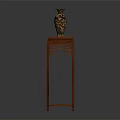 Carved Mahogany Flower Stand With Golden Patterned Vase On Top