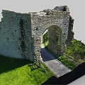 Ancient Stone Arch Ruins In Countryside With Green Grass And Pathway