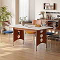 Bright Restaurant Interior With White Top Dining Table Wooden Legs And Colorful Cushioned Chairs