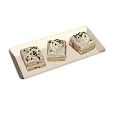 Delicious Layered Cream Cakes Topped With Chocolate Shavings On White Rectangular Tray