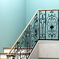 Staircase With Wrought Iron Decorative Railing And Wooden Steps Light Blue Wall Pink Floor