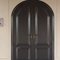 Arched Black Paneled Double Doors With Golden Handles And Light Colored Walls