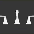 Modern Chrome Bathroom Faucet Set With Three Sleek Metal Fixtures And Reflective Surface