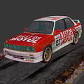 Red and white racing car with BASTOS MOTUL logos number 83 on track surface