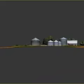 Aerial View Of Rural Farm With Multiple Silos Red Barn Green Grass And Trees