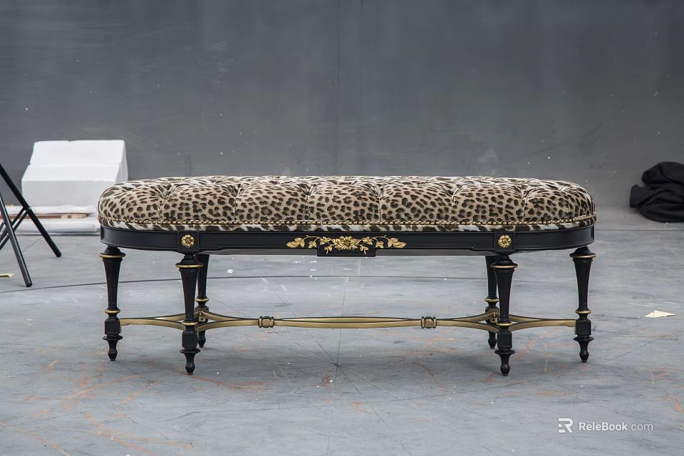 Elegant Leopard Print Upholstered Bench With Black Legs And Gold Accents On Gray Floor 3d model 