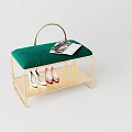 Stylish Sofa Bench with Green Cushion and Gold Frame Topped with Magazine and Shoes Below