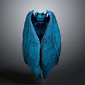 Horned Demonic Character With Large Blue Wings And Mystical Features