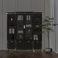 Elegant Green Bookcase With Gold Accents Glass Doors Books And Decorations Near Potted Plant