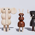 Wooden Animal Shaped Dolls Featuring Elephant Bird and Horned Designs in Natural Tones