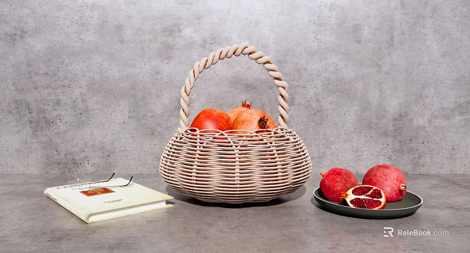 Wicker Basket With Pomegranates Open Book Eyeglasses And Plate With Sliced Pomegranate 3d model 