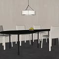 Modern Oval Dining Table Set with Black Tabletop White Chairs Pendant Light and Fruit Bowl