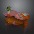 Stylish Wooden Coffee Table With Double Round Top Potted Plant Teapot And Tea Cups