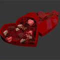 Heart Shaped Red Gift Box Filled With Assorted Chocolates And Pink Bow