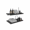 Bathroom Accessories Display On Black Shelves With White Towels And Toiletries