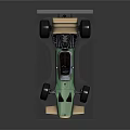 Vintage Green Single Seater Racing Car With Large Wheels And Rear Wing