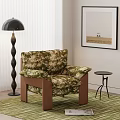 Single Sofa With Floral Patterned Fabric Wooden Frame Floor Lamp And Side Table In Room