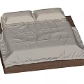 Cozy Double Bed With White Pillows White Quilt And Brown Wooden Frame