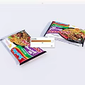 Two Packs Of Indomie Instant Noodles With Colorful Packaging And Food