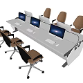 Long White Office Desk With Multiple Computer Monitors And Brown Wheeled Office Chairs