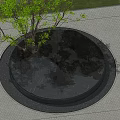 Garden Scene With Circular Black Rockery Stone Surrounded By Green Trees Grass And Paved Ground