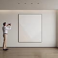 Man Taking Photo of Landscape Painting in Modern Room With Wooden Floor And White Wall